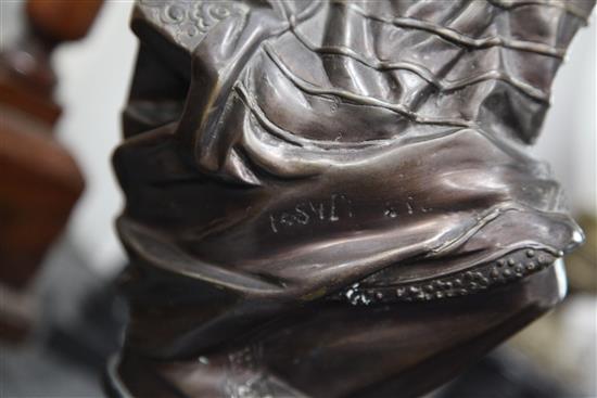 A pair of 20th century bronzed metal busts of male and female Arabs, 13in.